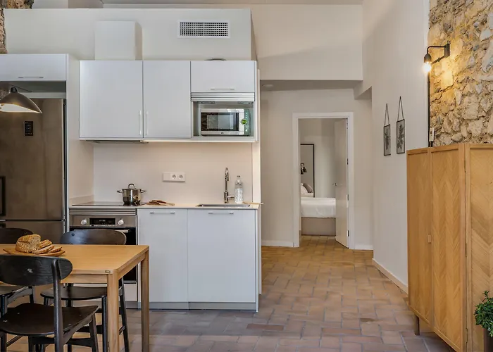 Отель La Comuna By Bon Dia Residences